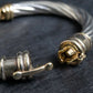 “UNOAERRE” Twisting designed silver bracelet