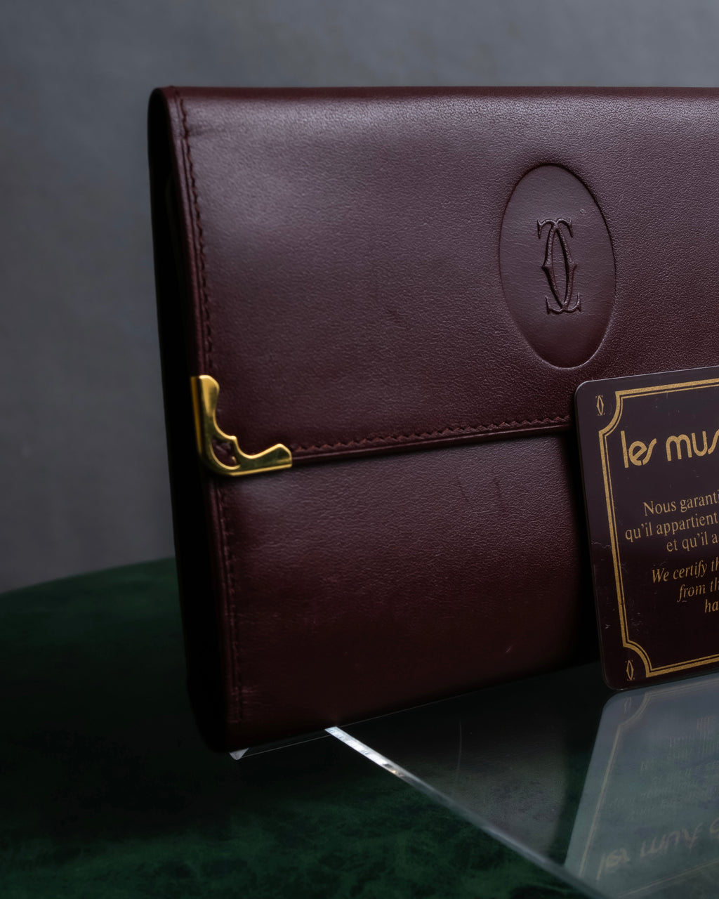 "Cartier" Les Must de Cartier bordeaux color leather wallet