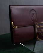 "Cartier" Les Must de Cartier bordeaux color leather wallet