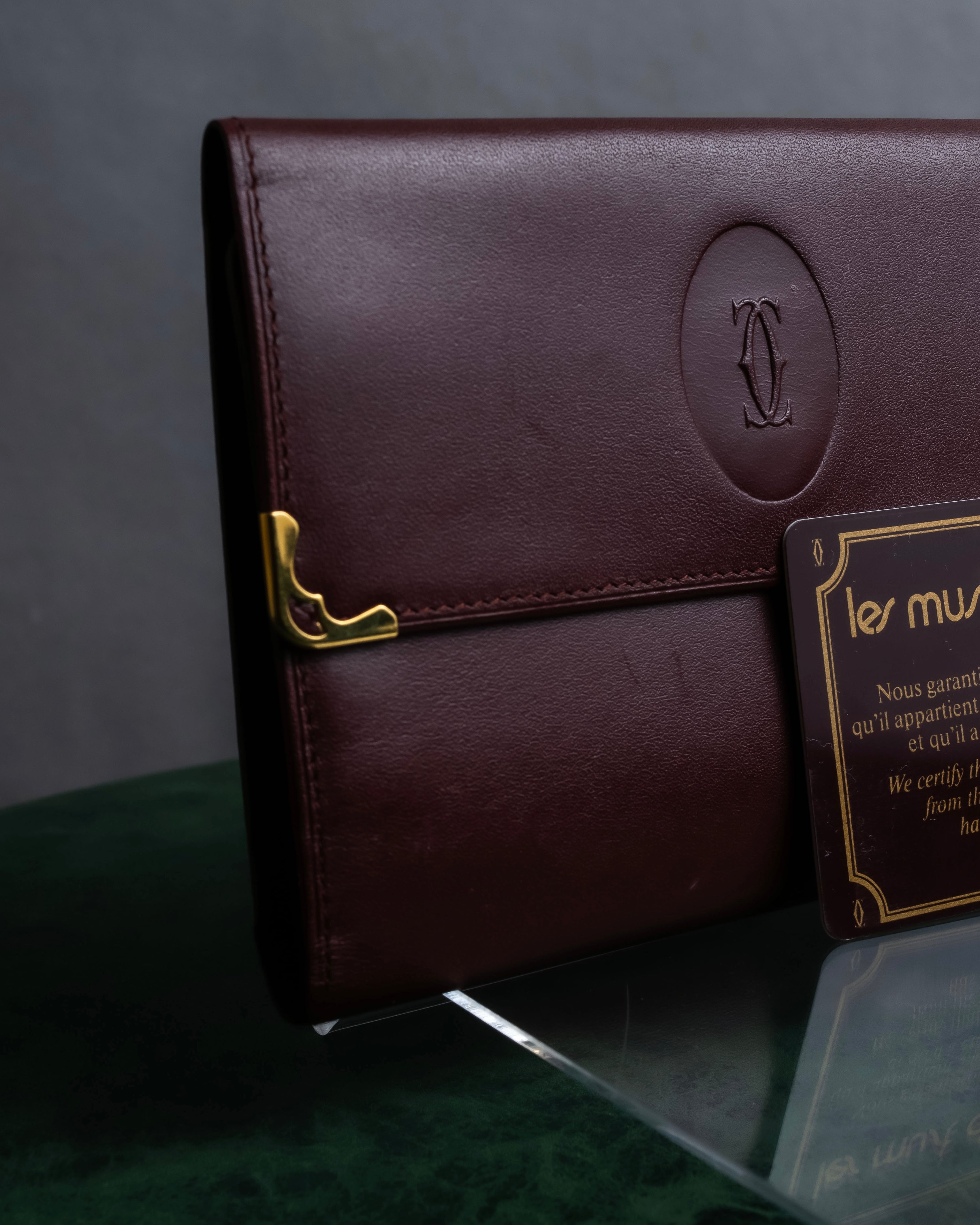 "Cartier" Les Must de Cartier bordeaux color leather wallet