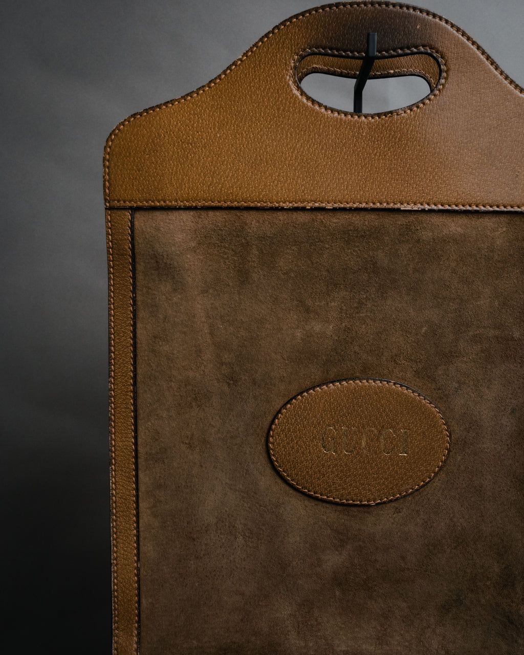 “GUCCI” Late 70’s-early 80’s suede and leather cutout handle bag