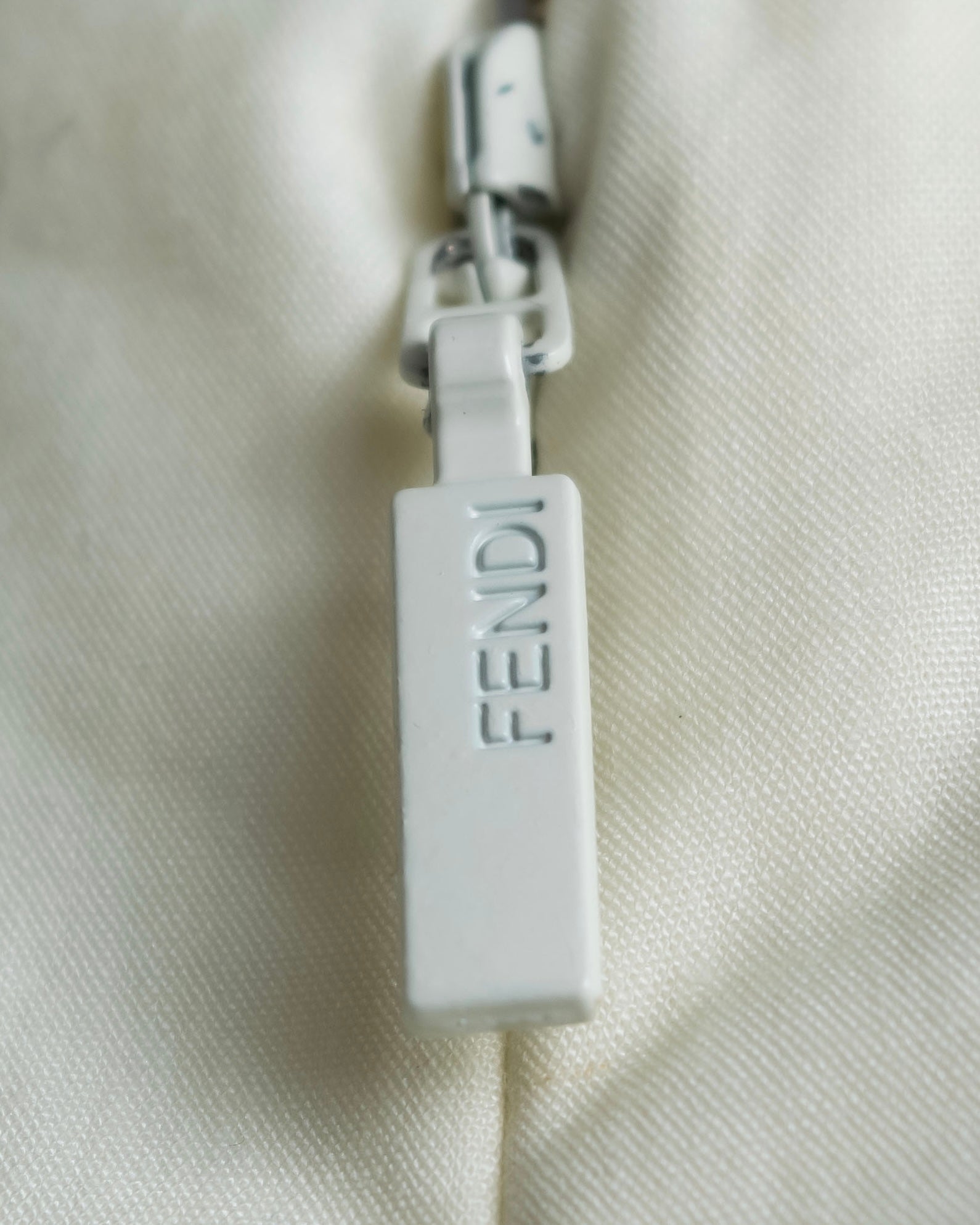 "FENDI" hole pattern and tack designed skirt