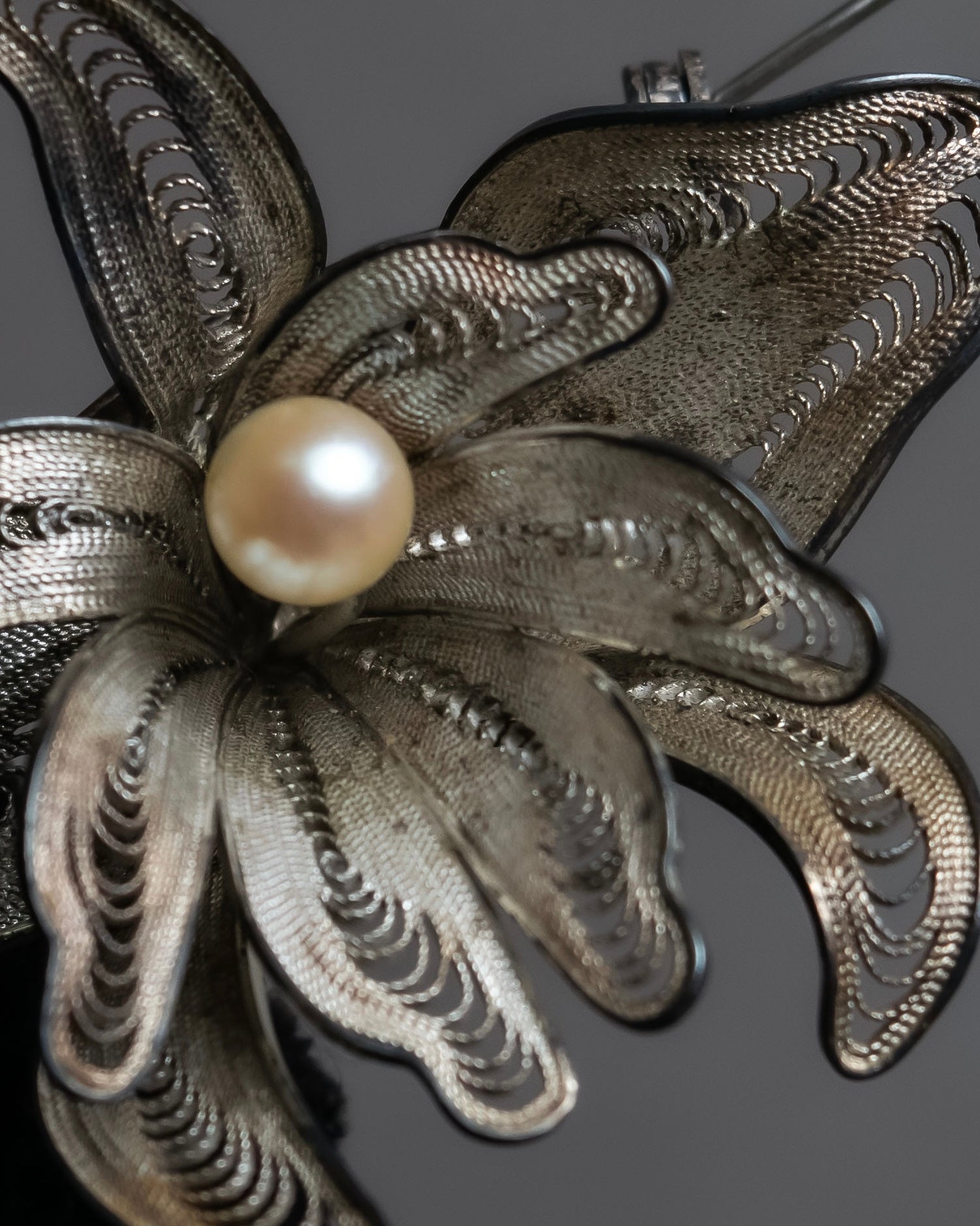 "Vintage petal motif broach"