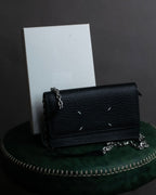 "MAISON MARGIELA" Grained leather chain wallet bag