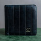 "CHANEL" Mademoiselle line design coco mark engraved bi fold wallet