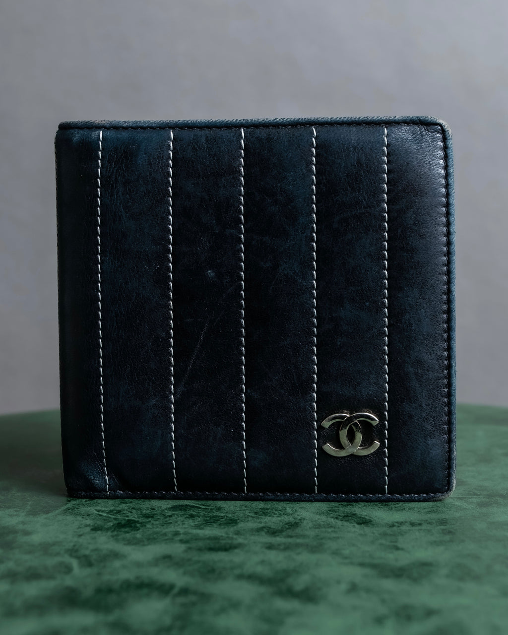 "CHANEL" Mademoiselle line design coco mark engraved bi fold wallet