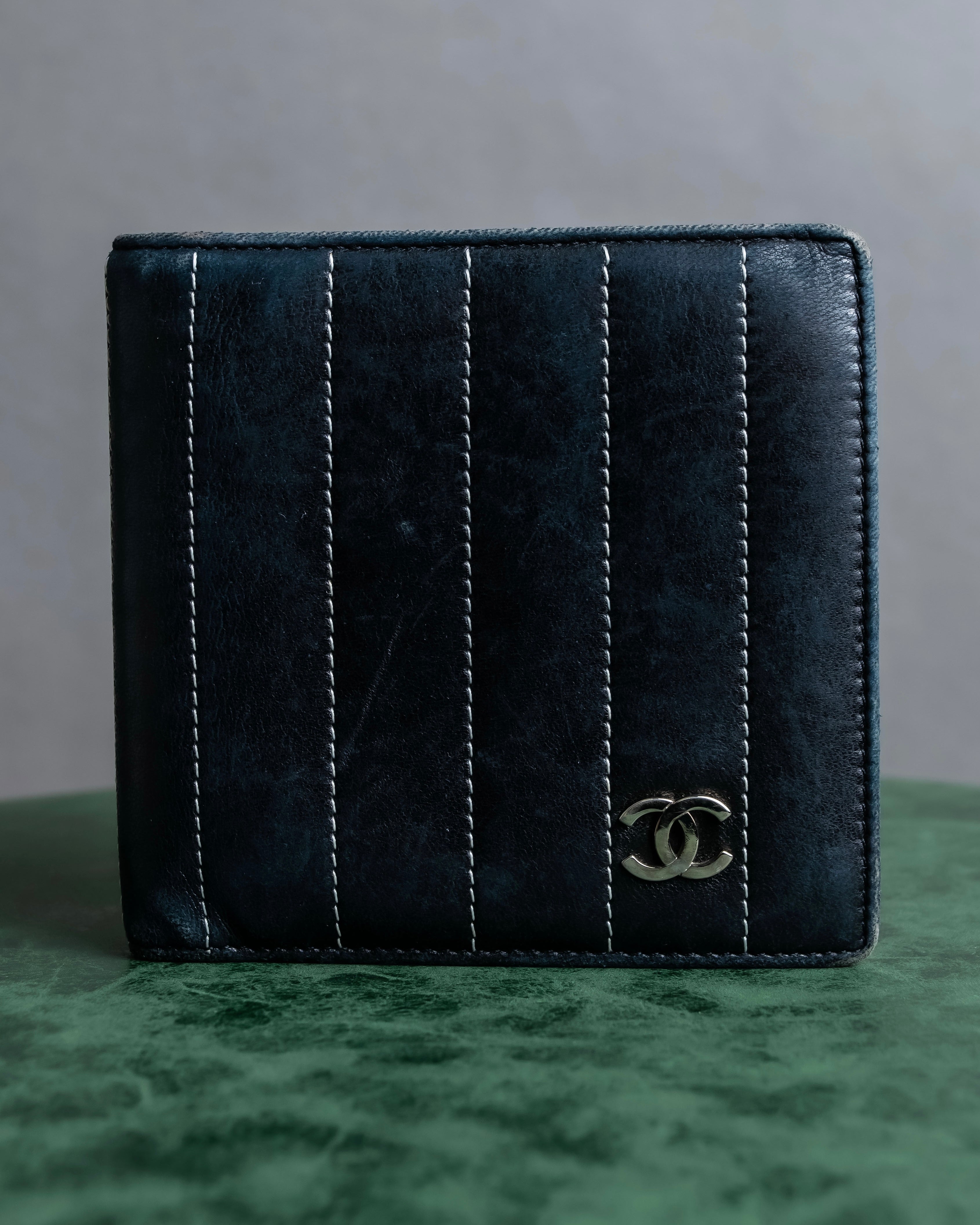 "CHANEL" Mademoiselle line design coco mark engraved bi fold wallet