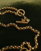 “NINA RICCI” Late 80’s-90’s gold tone openwork pendant necklace