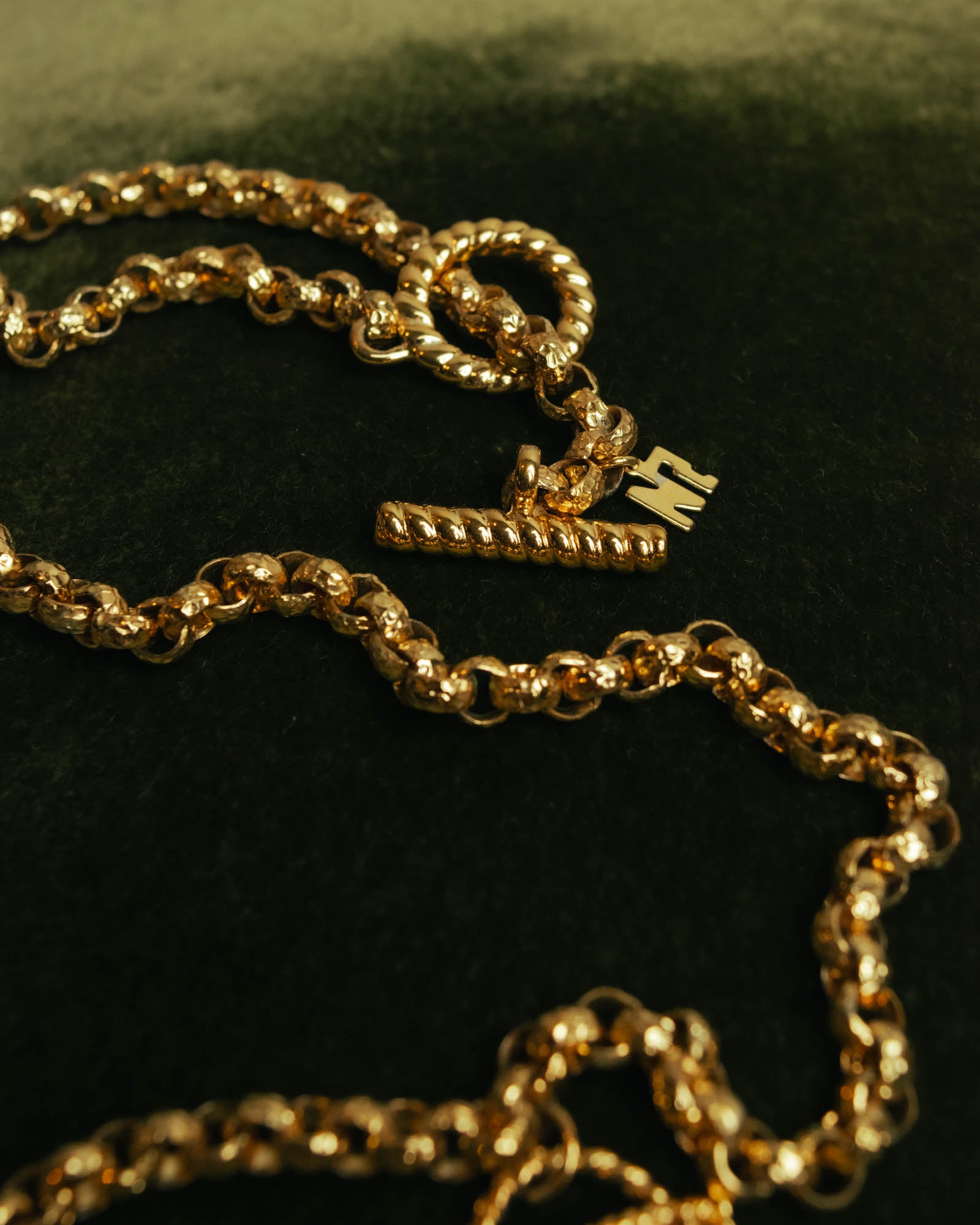 “NINA RICCI” Late 80’s-90’s gold tone openwork pendant necklace