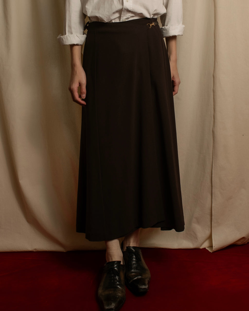 "HERMES" 90's Gold parts design derived from horse tack flared skirt