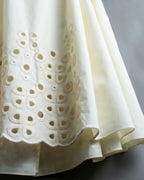 "FENDI" hole pattern and tack designed skirt