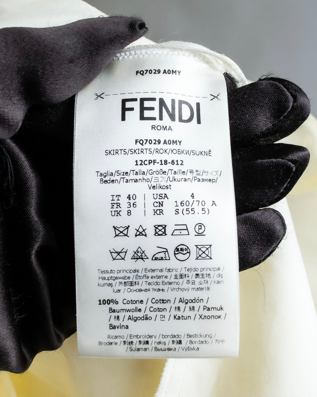 "FENDI" hole pattern and tack designed skirt