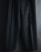 "CHANEL" high-waisted pleated trousers with signature gold button