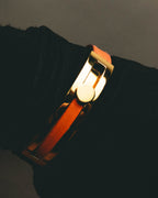 "Hermès" 00's Vibrant orange leather bracelet