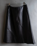 "HARVEY LOGAN" Diagonal cut design lamb leather flare skirt
