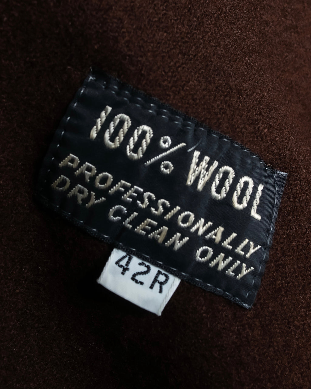 "CHRISTIAN DIOR MONSIEUR"
 Dark brown oversized trench coat