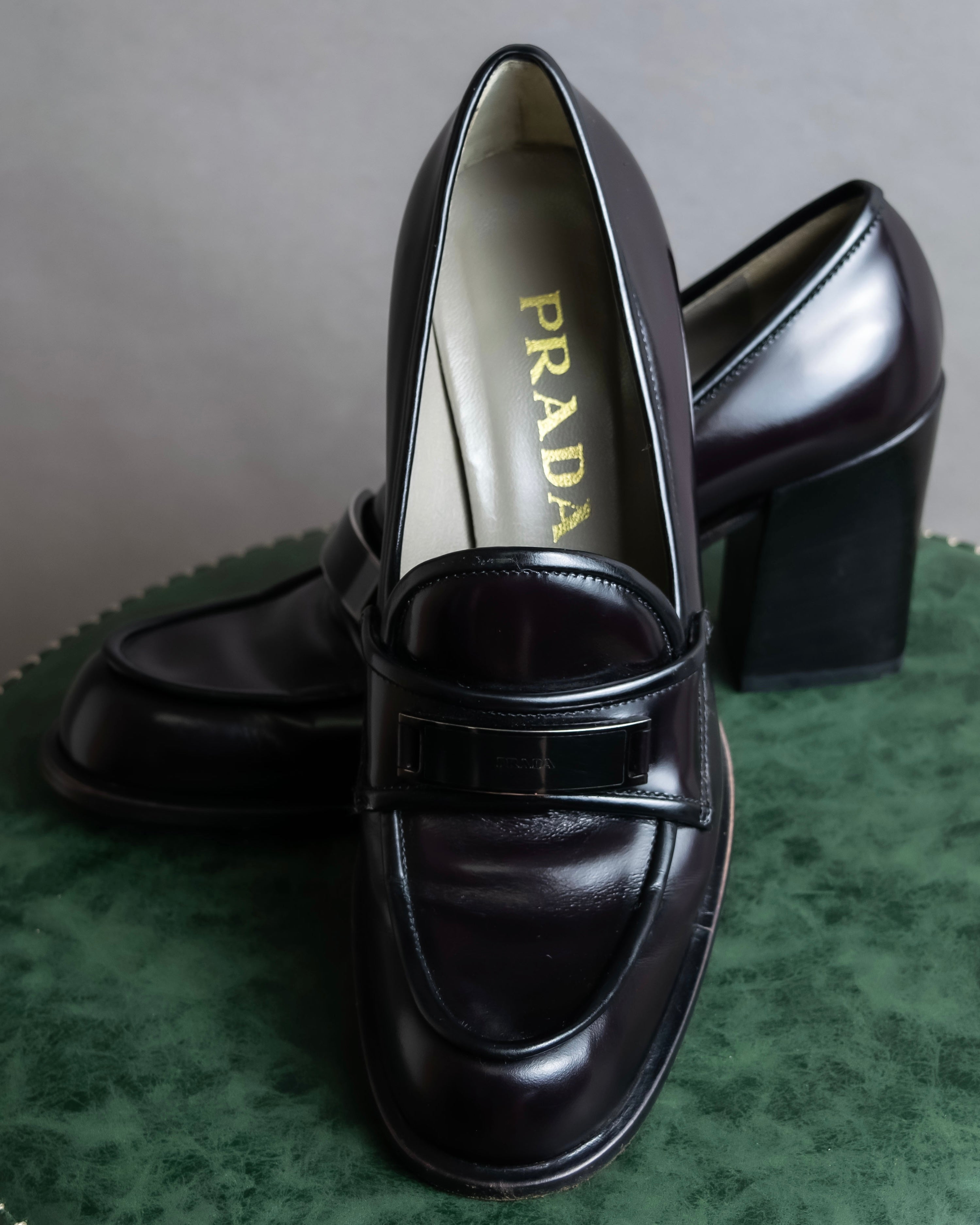 "PRADA" Metal band design leather heel loafers