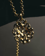 "Yves Saint Laurent" 80's-90's Sculptural floral pendant necklace