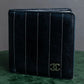 "CHANEL" Mademoiselle line design coco mark engraved bi fold wallet