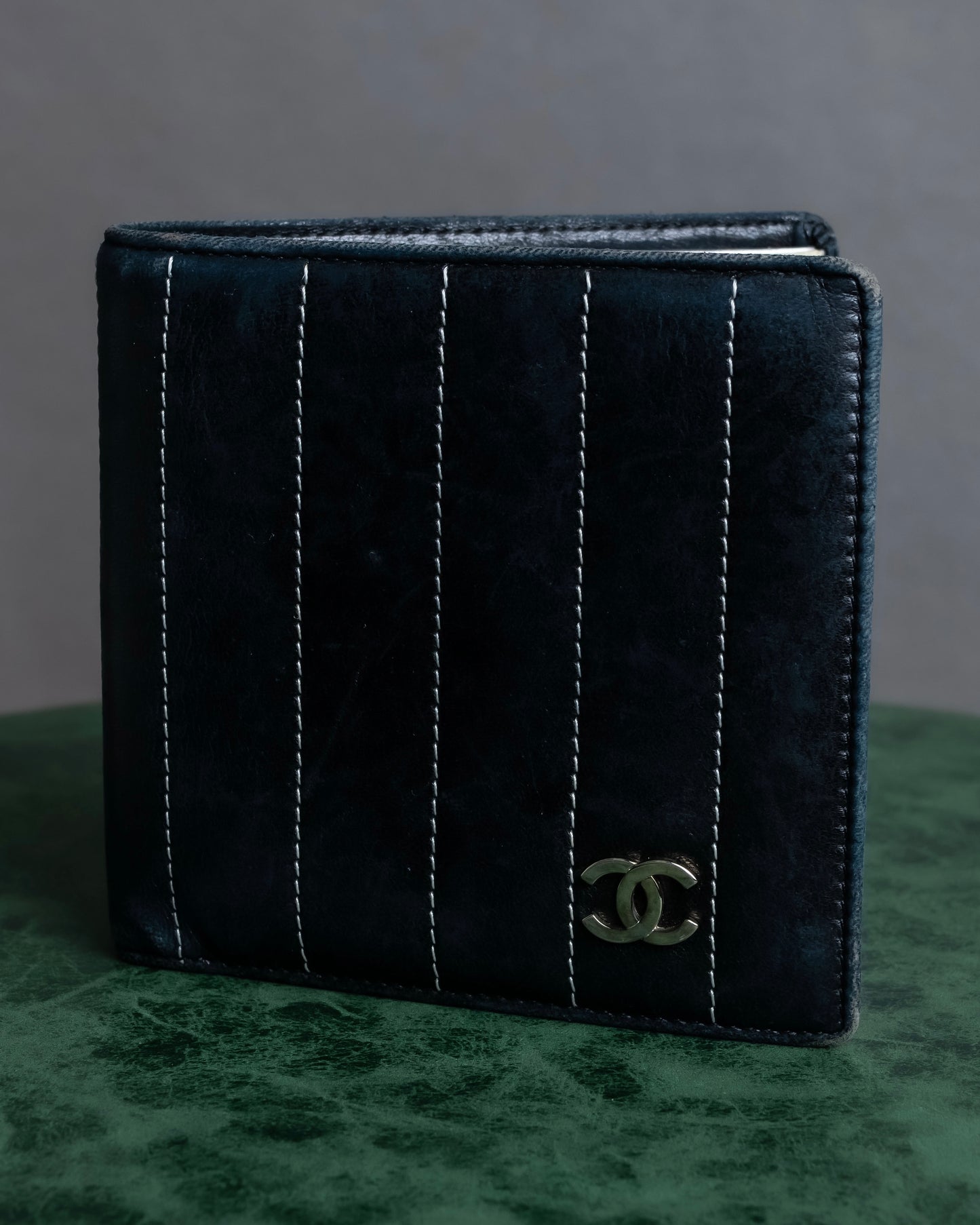 "CHANEL" Mademoiselle line design coco mark engraved bi fold wallet