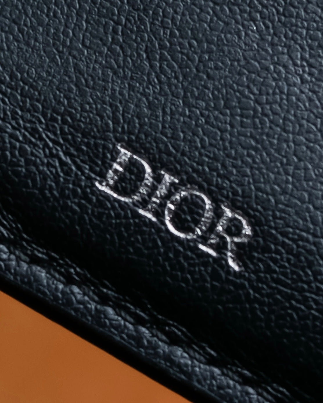 "Dior" Logo engraved bi-fold leather wallet