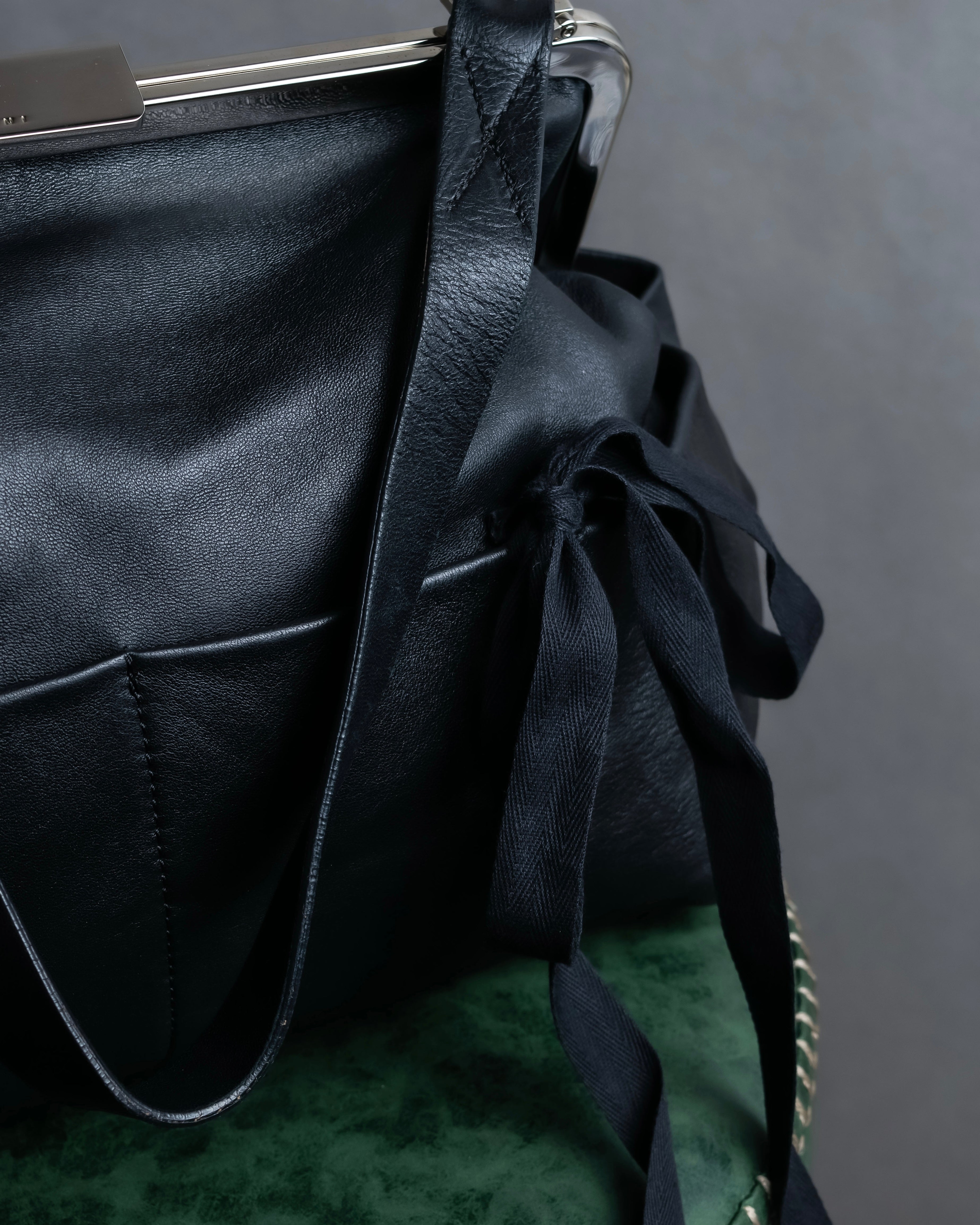 "MARNI" Side ribbon design rounded body leather bag