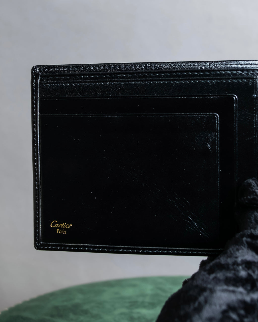 "Cartier" 2C logo engraved leather bi-fold wallet