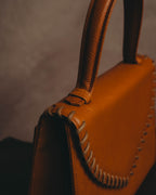 "Yves Saint Laurent" 70's-80's Cognac leather top handle bag