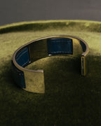 “HERMÈS” 90’s-00’s Leather inset gold metal cuff bangle