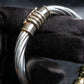 “UNOAERRE” Twisting designed silver bracelet