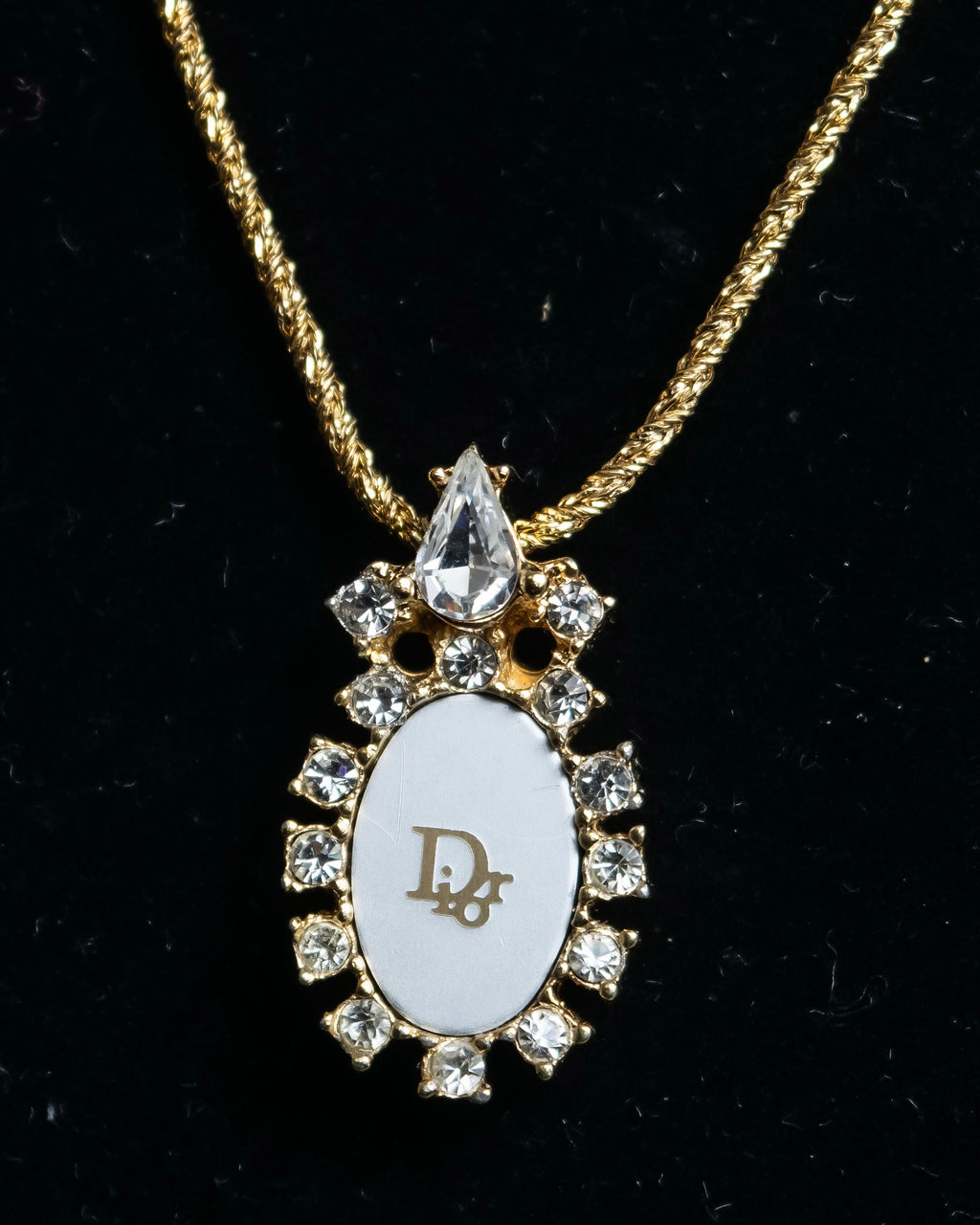 "Christian Dior" Trotter logo engraved gold pendan