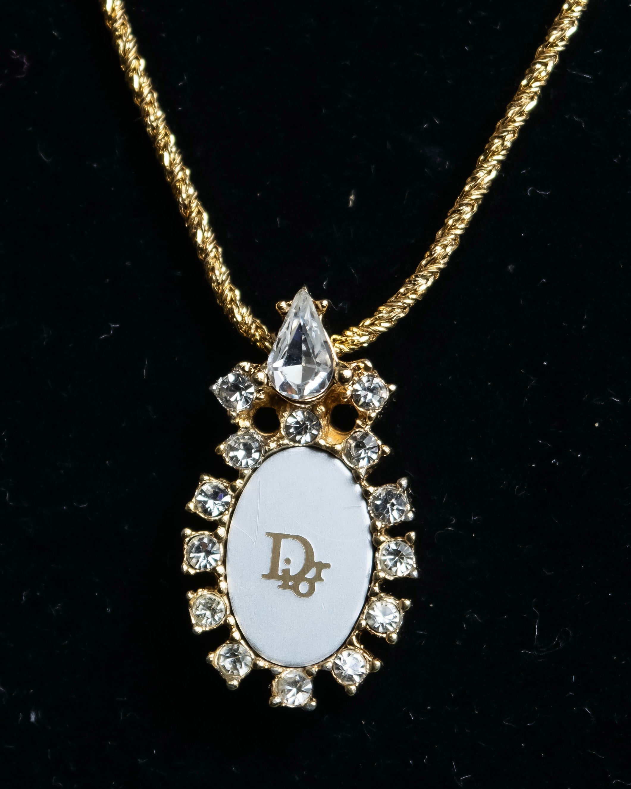 "Christian Dior" Trotter logo engraved gold pendan