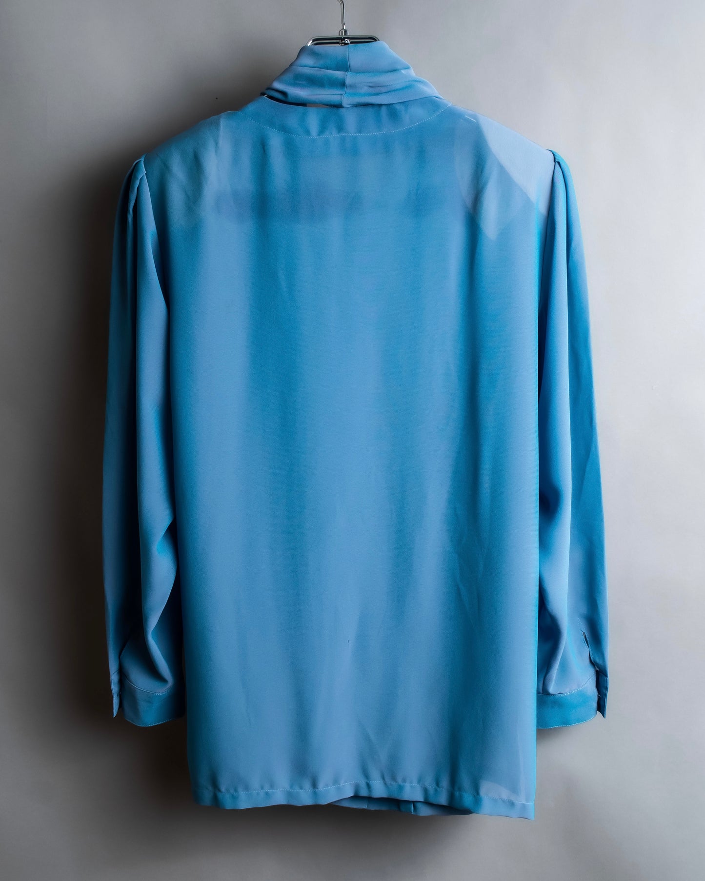 "PIERRE BALMAIN" Beautiful light blue color sheer bowtie blouse