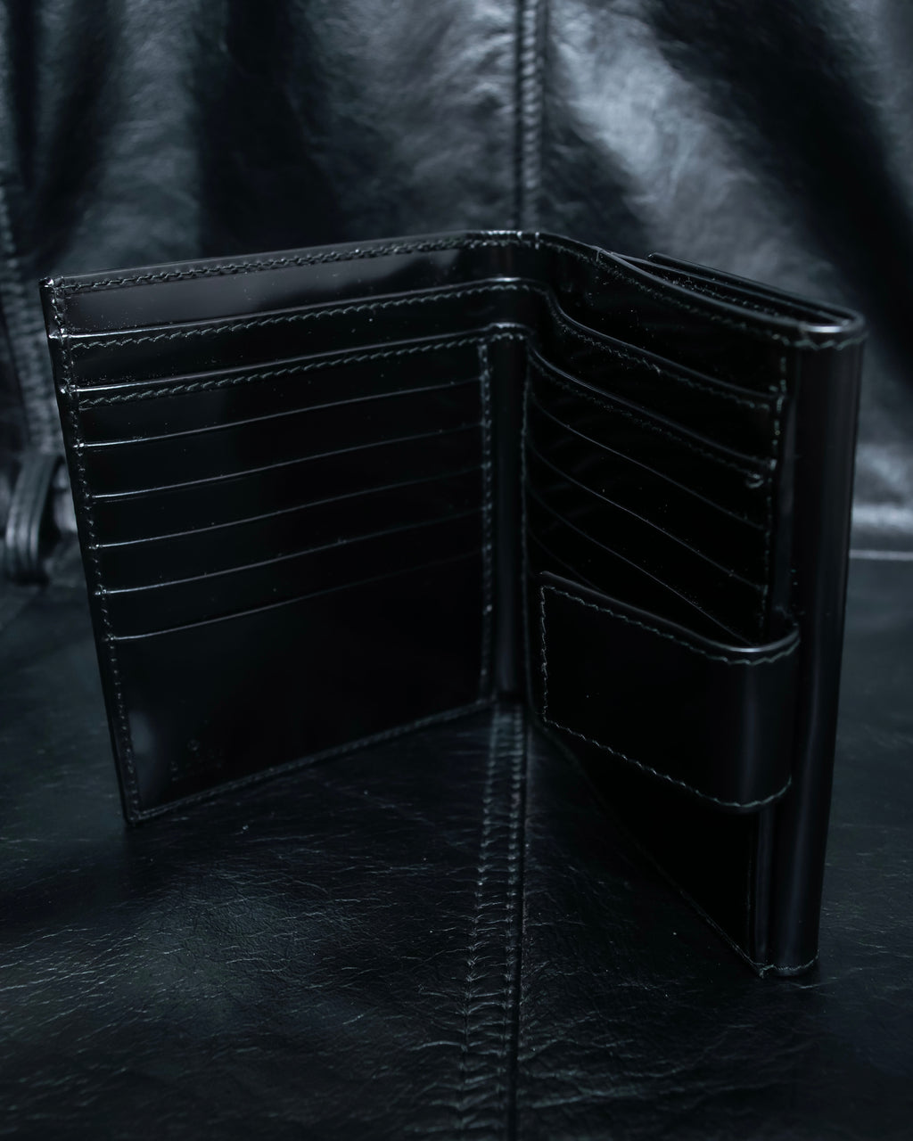 "GUCCI" Canvas and leather bi-fold wallet