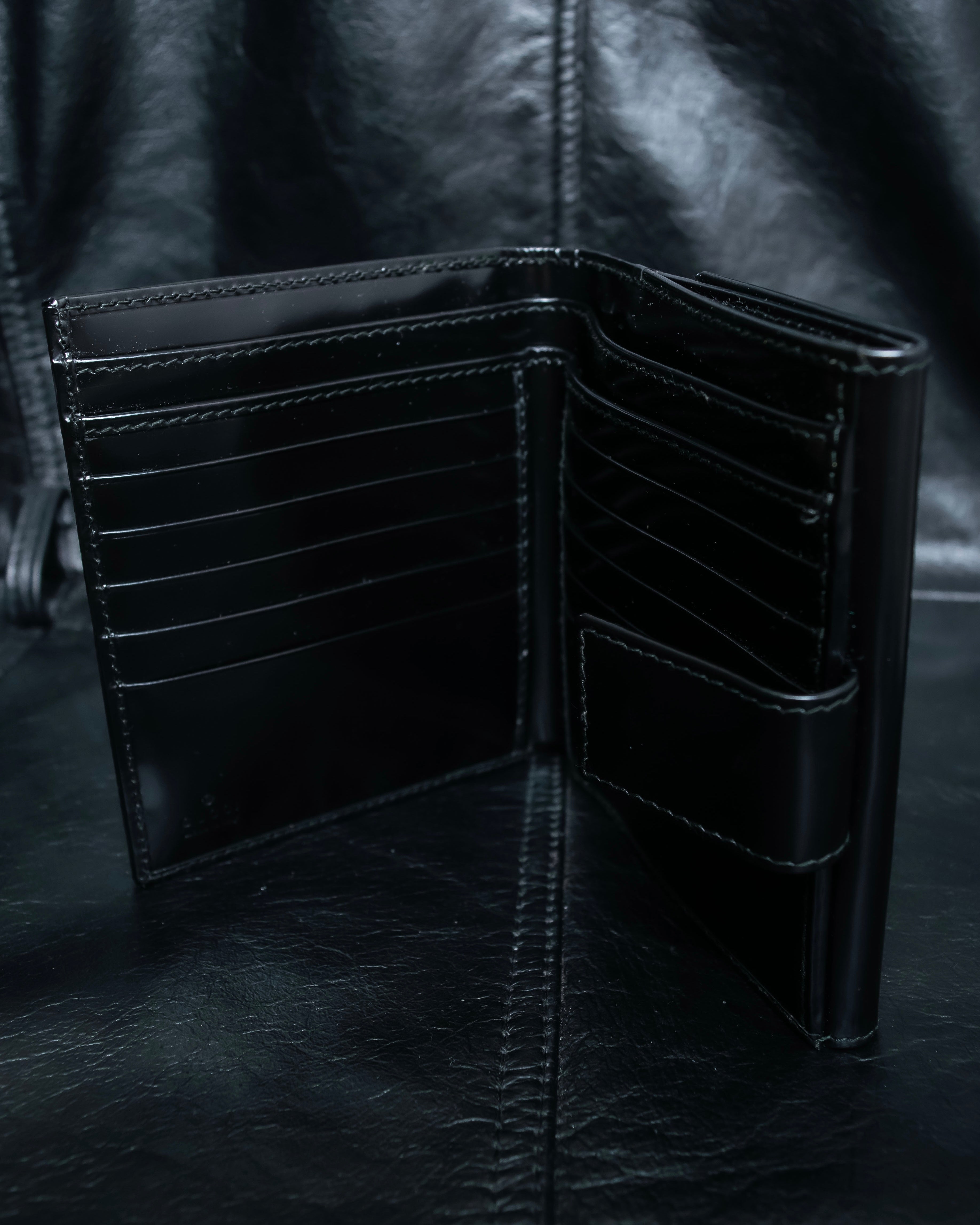 "GUCCI" Canvas and leather bi-fold wallet