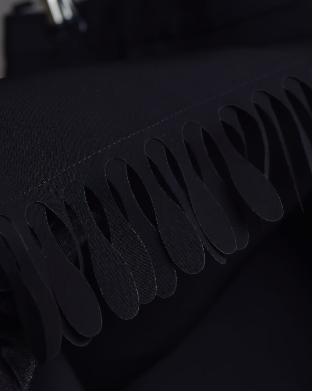 "ISSEY MIYAKE" Organic cutout fringe wrap skirt