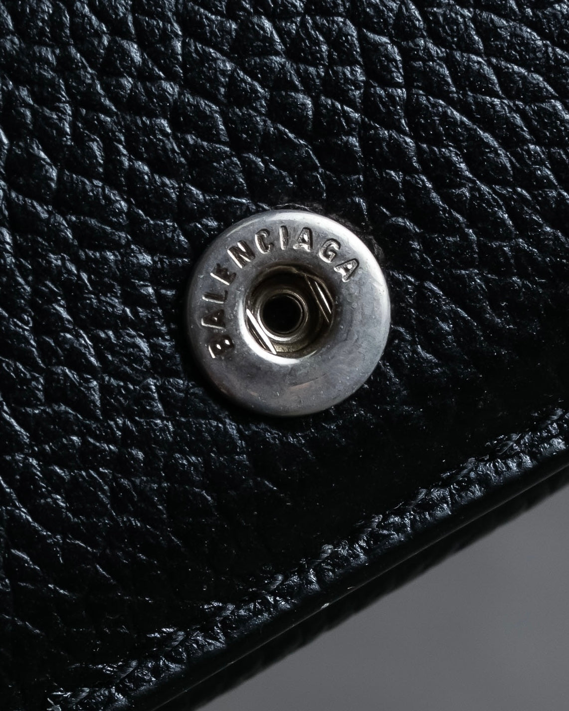 "BALENCIAGA" Logo engraved compact leather tri-fold wallet