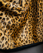 "GIANNI VERSACE UPDATE"
 Fur trimmed wool cashmere maxi double breasted coat