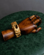 "Christian Lacroix" Sculptural detail gold bracelet