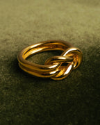 "HERMES" Sculptural gold tone knot Atame scarf ring