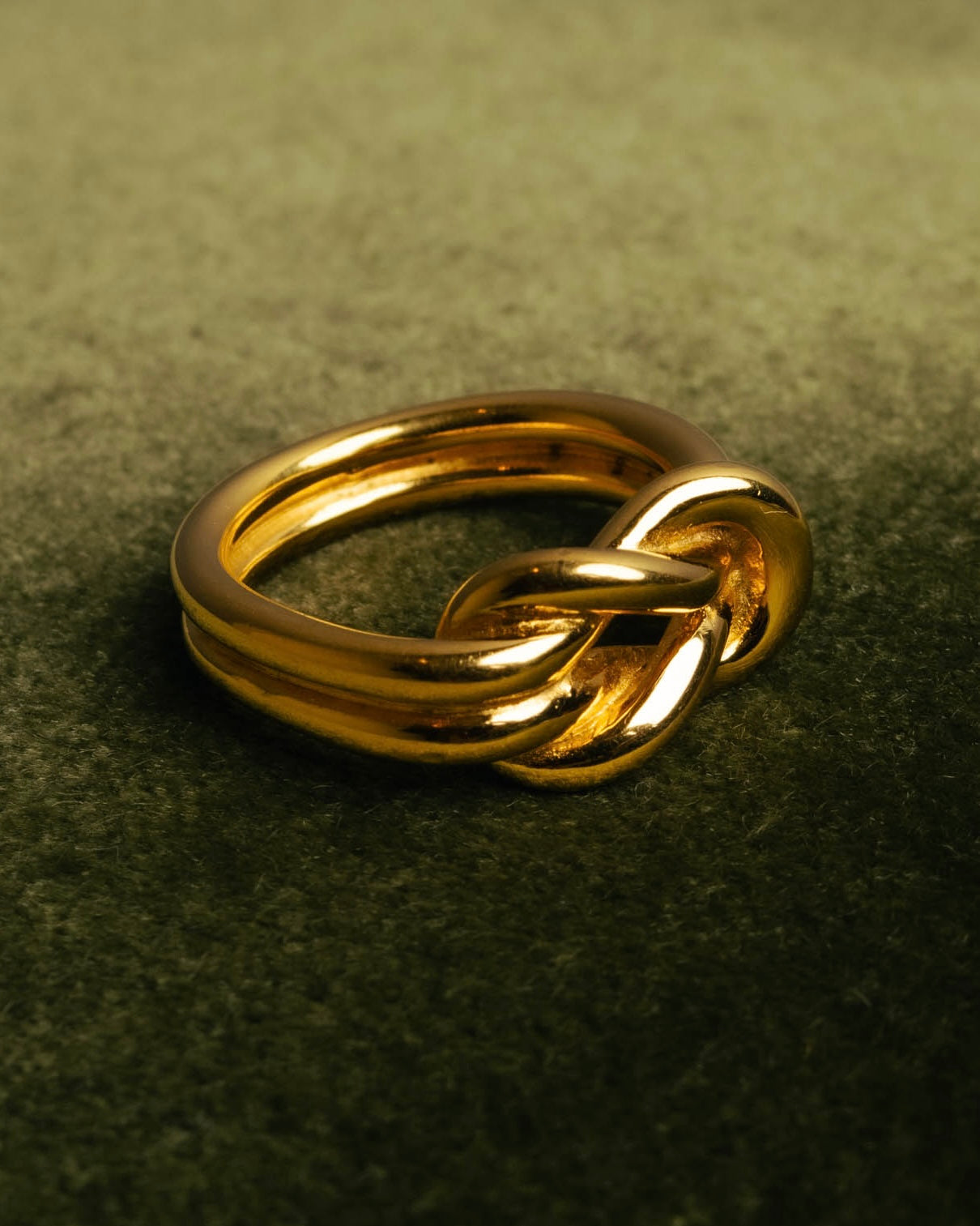 "HERMES" Sculptural gold tone knot Atame scarf ring