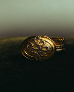 “Nina Ricci” 80's-90's Gold-tone floral clip-on earrings