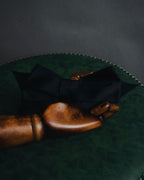 "CHANEL" 90’s black satin and grosgrain ribbon brooch