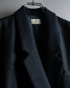 Tight-waisted wool shirt and black coat