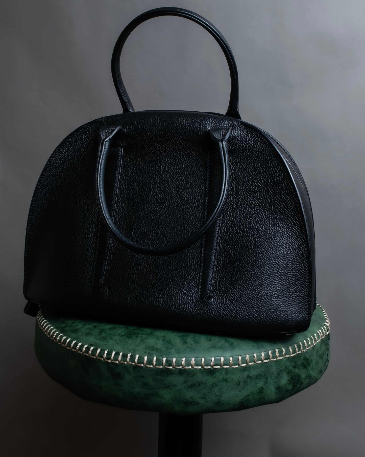 "MORABITO" Half moon design grained leather handbag