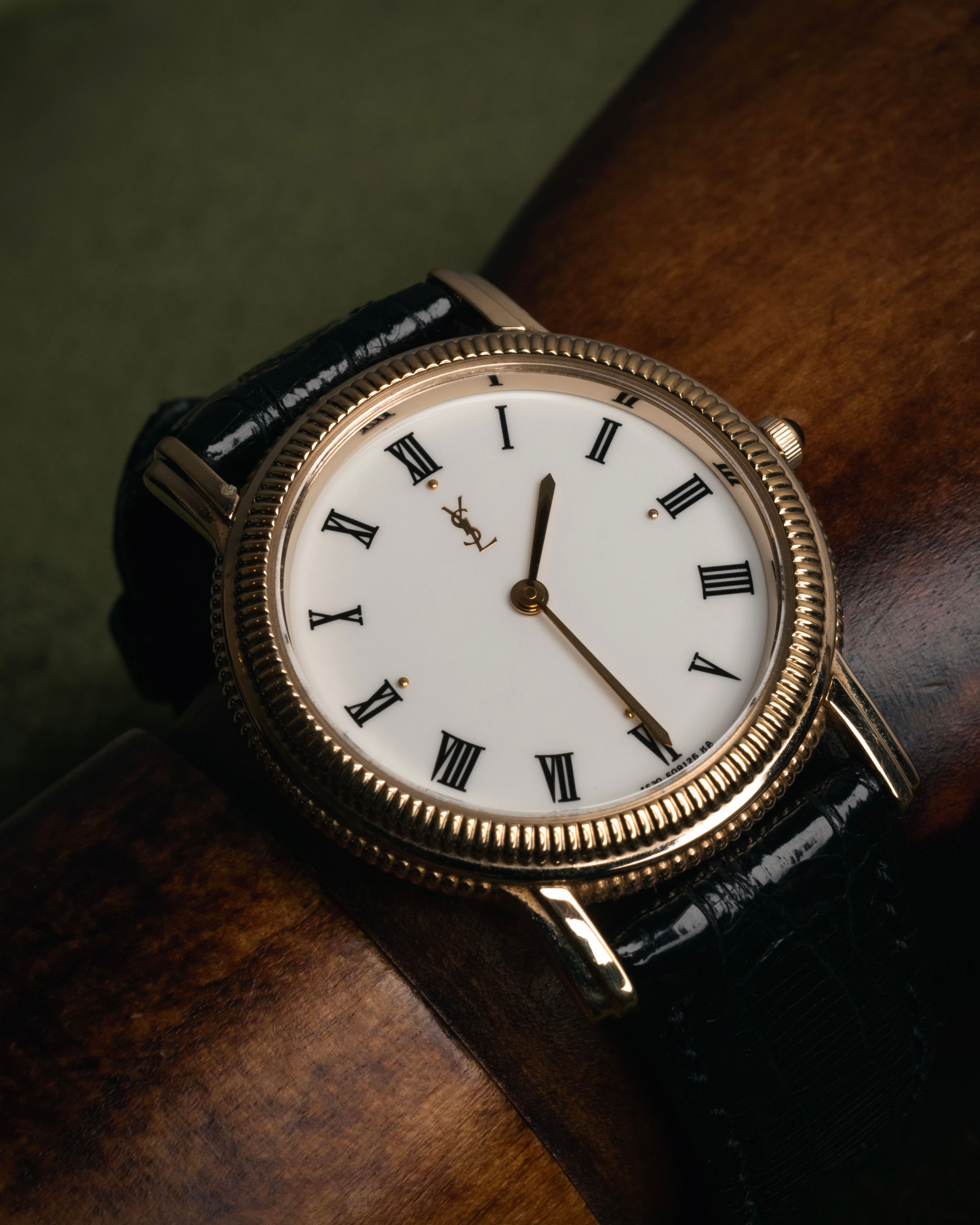 “Yves Saint Laurent” 80’s-90’s coin edge quartz leather watch