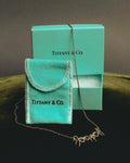 "Tiffany & Co." 80's-90's Sculptural triple bow necklace