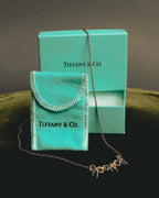 "Tiffany & Co." 80's-90's Sculptural triple bow necklace
