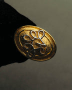 “Nina Ricci” 80's-90's Gold-tone floral clip-on earrings