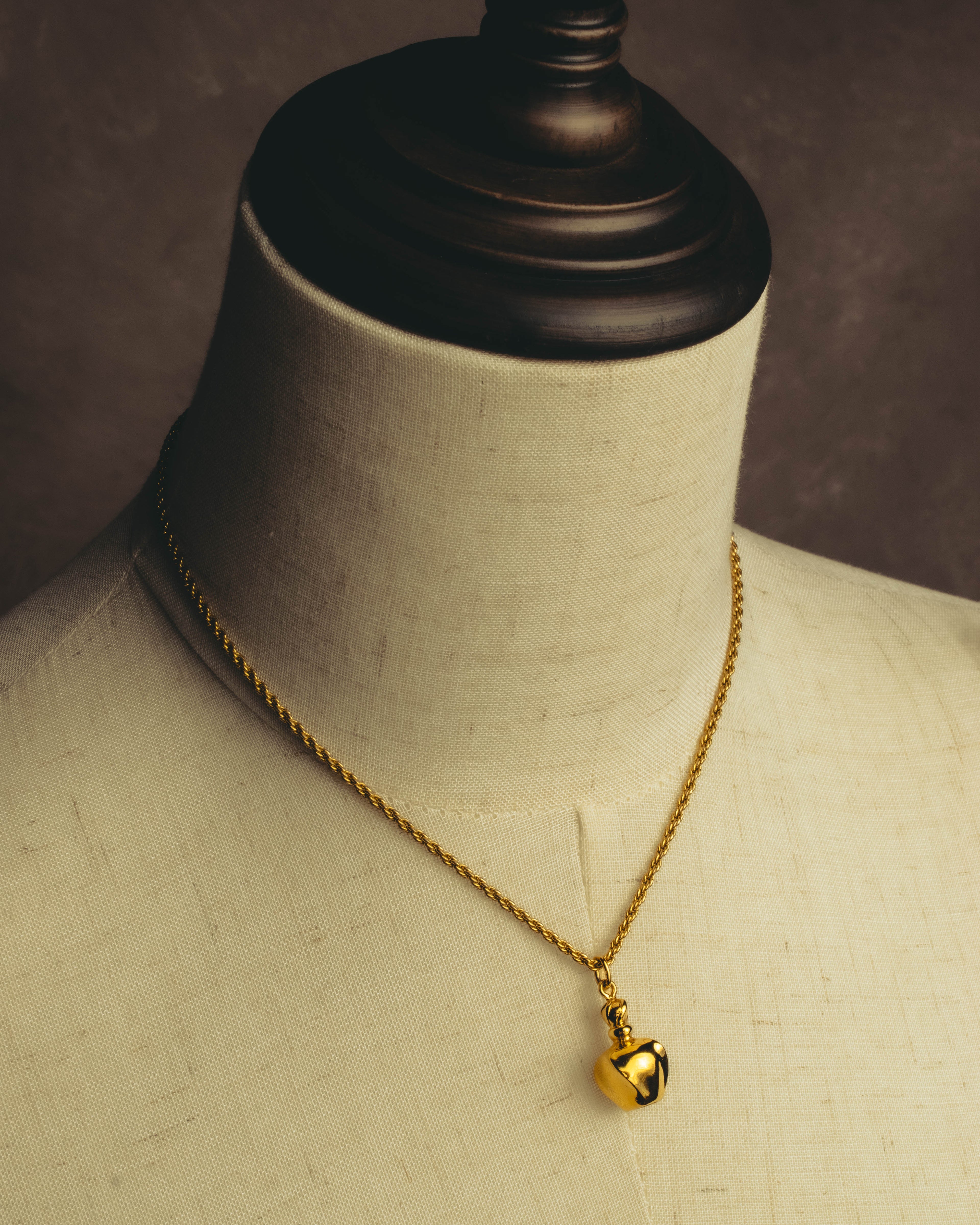 "Christian Dior" 80's-90's Gold tone bottle pendant necklace